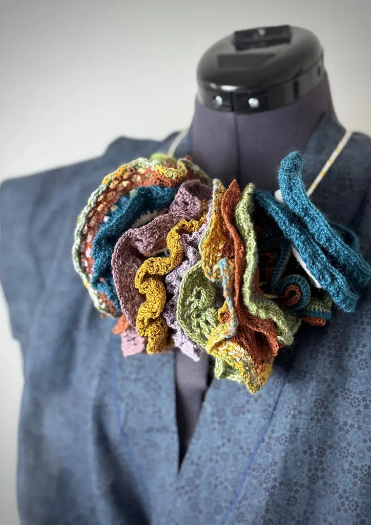 Sustainably made with repurposed materials. Like a neckless on a mannequin.