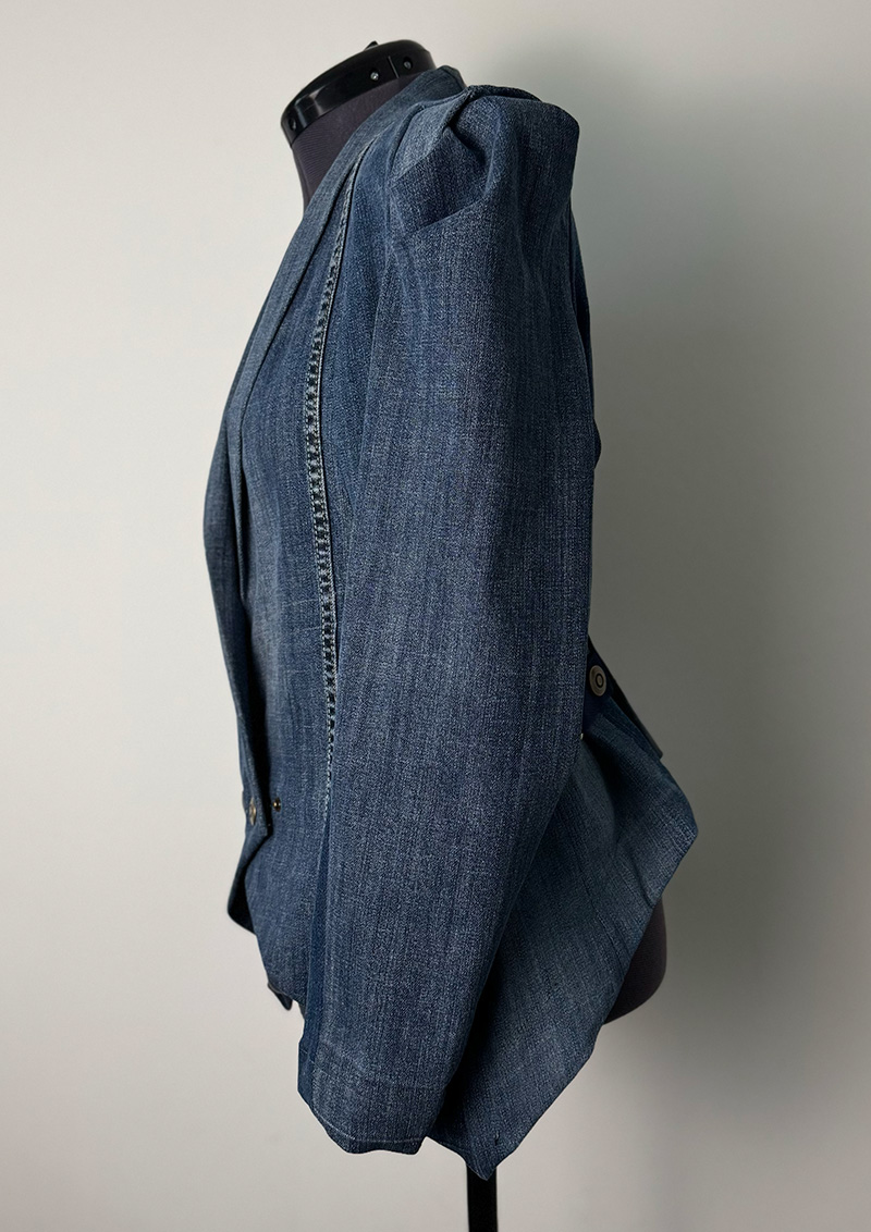 Four-Blues upcycled denim jacket, handcrafted in Zürich. Product photo. Left.