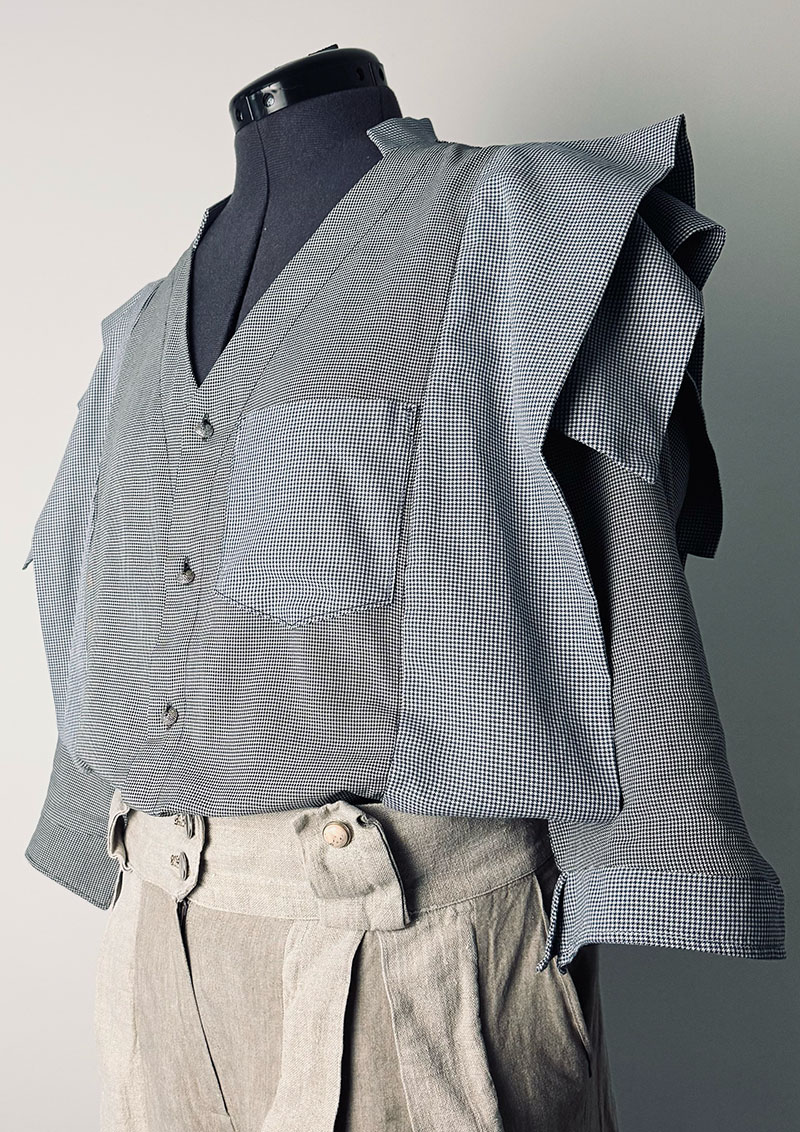 Same upcycling logic when upcycling men's shirts, in dark blue and black Front-left side view.