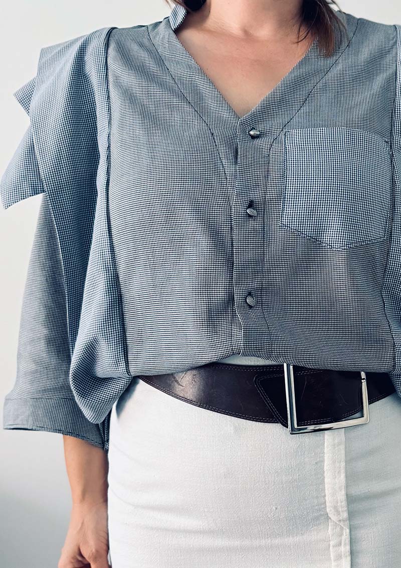 Blouse with big pleats Nr1.2 worn with linen white pencil skirt, zoomed front view. Upcycling logic.