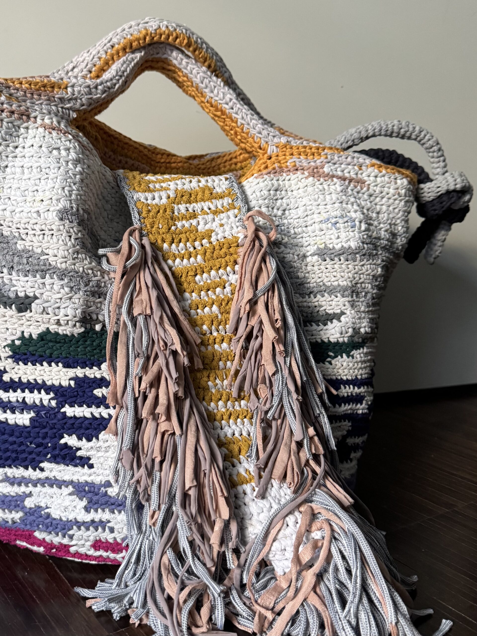 City Lights In The Water Bag - before 2nd pair of handles and long fringe closure strap