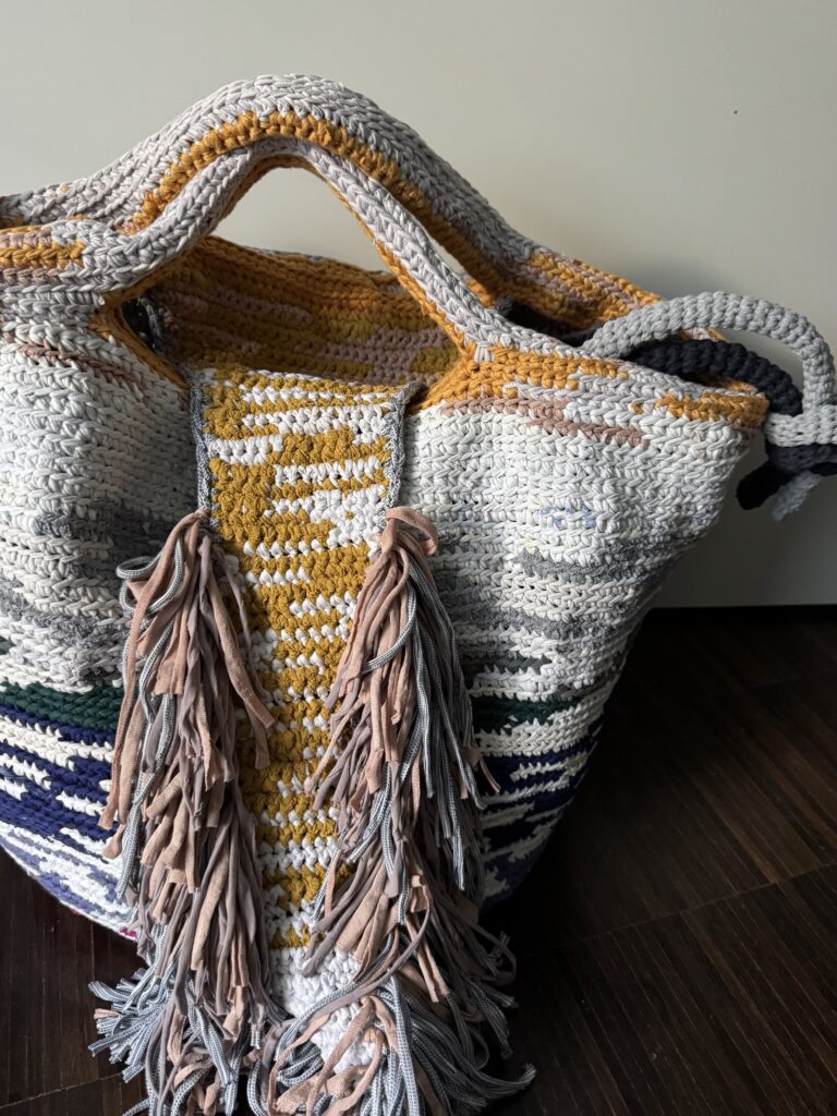T-Shirt to Bags City Lights In The Water Bag, in chic-boho style with front fringe closure.